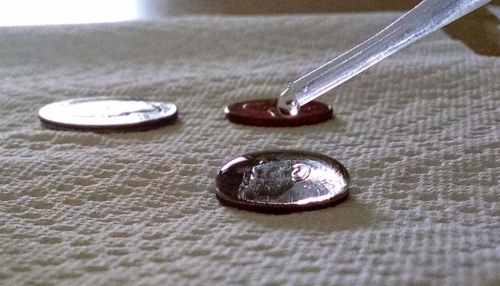 Have you ever done the drops of water on a coin experiment? Now is your chance. Gather up your spare change and get ready to be impressed by the results!